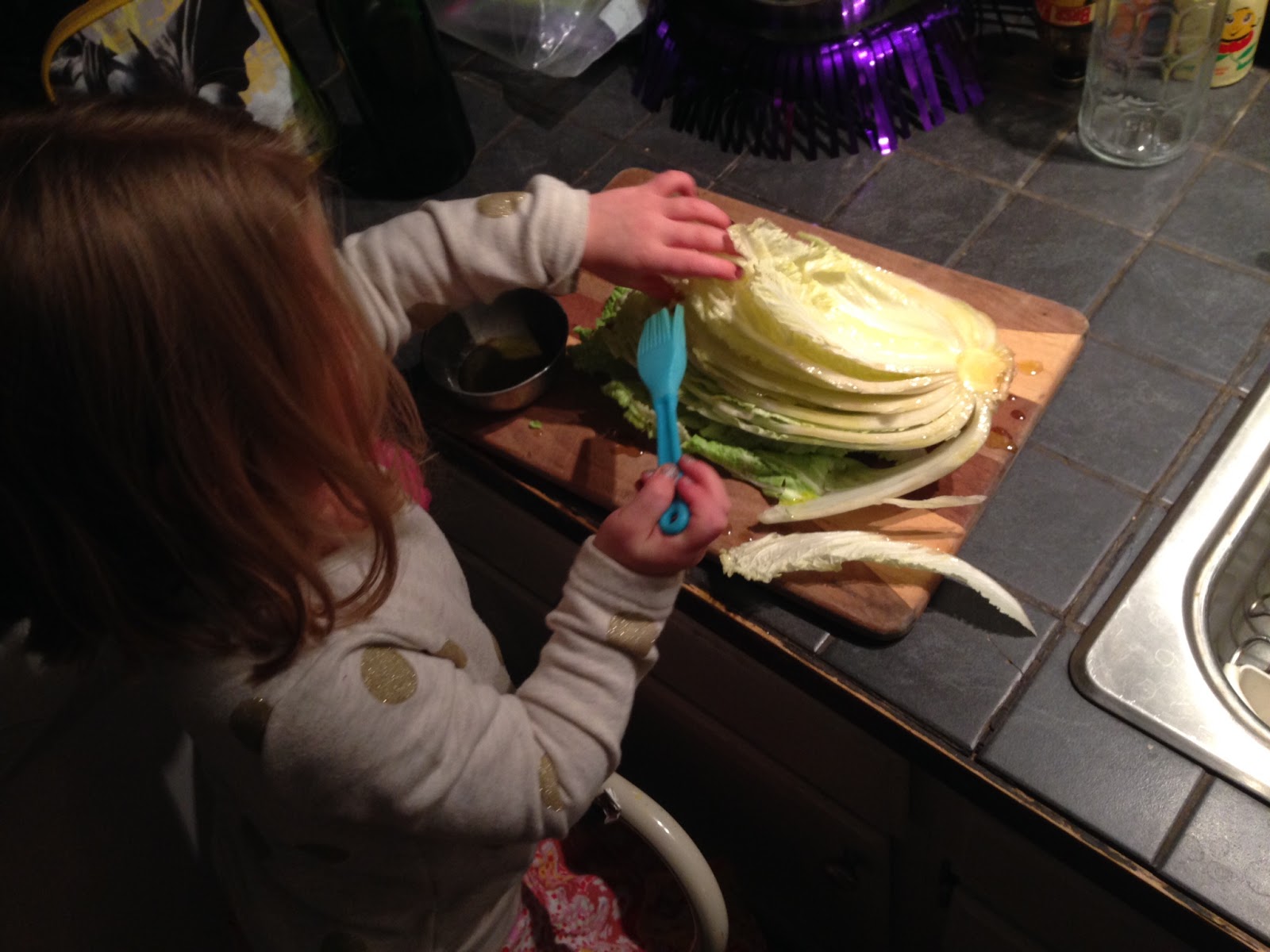 Erin's daughter enjoys their CSA share. Picture: Erin Eldermire.