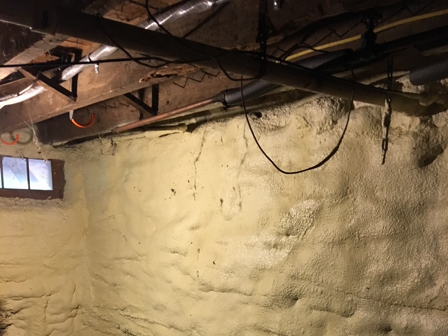 Marianne’s insulated walls in the basement of her farmhouse. Photo courtesy of Marianne Pelletier.