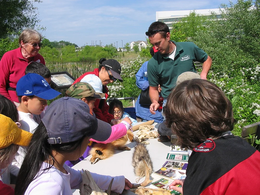 WSSI biologist at an educational event at Sunrise Valley Nature Park