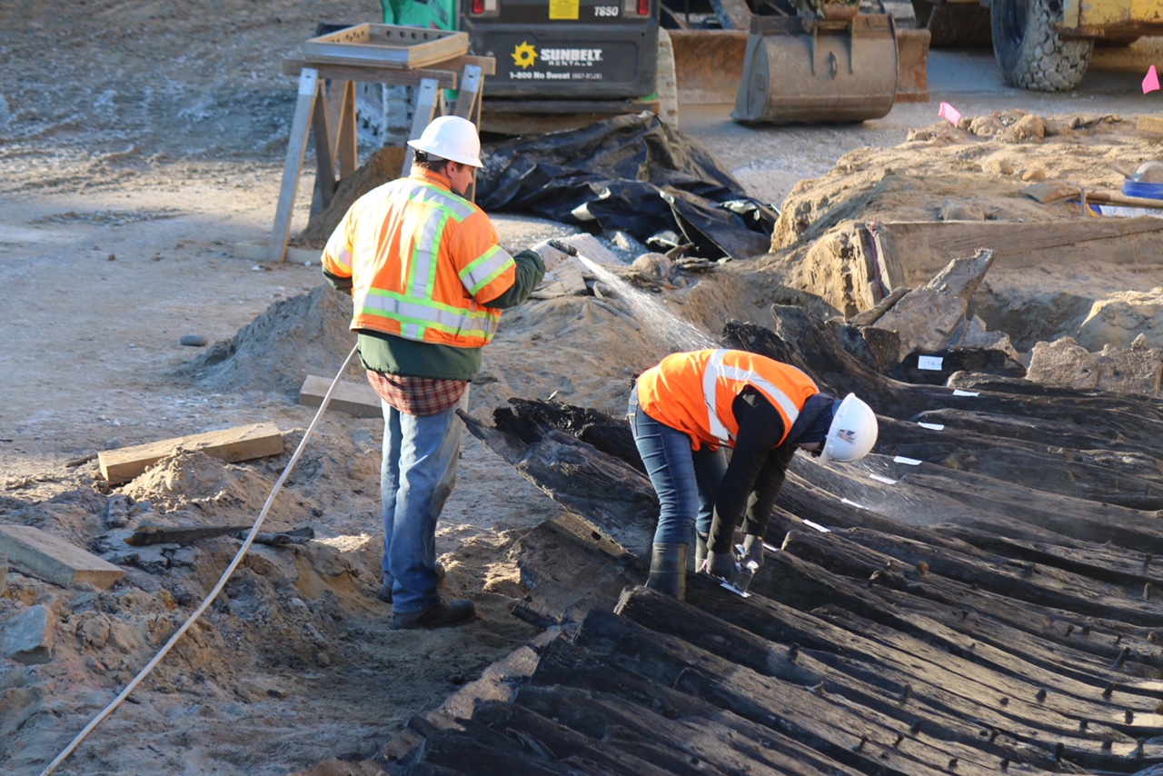  Our archeologists keep the hull of the 18th-century ship wet to prevent deterioration while the head conservator at the Maryland Archaeological Conservation (MAC) Laboratory, labels individual beams of the ship prior to disassembly for preservation.