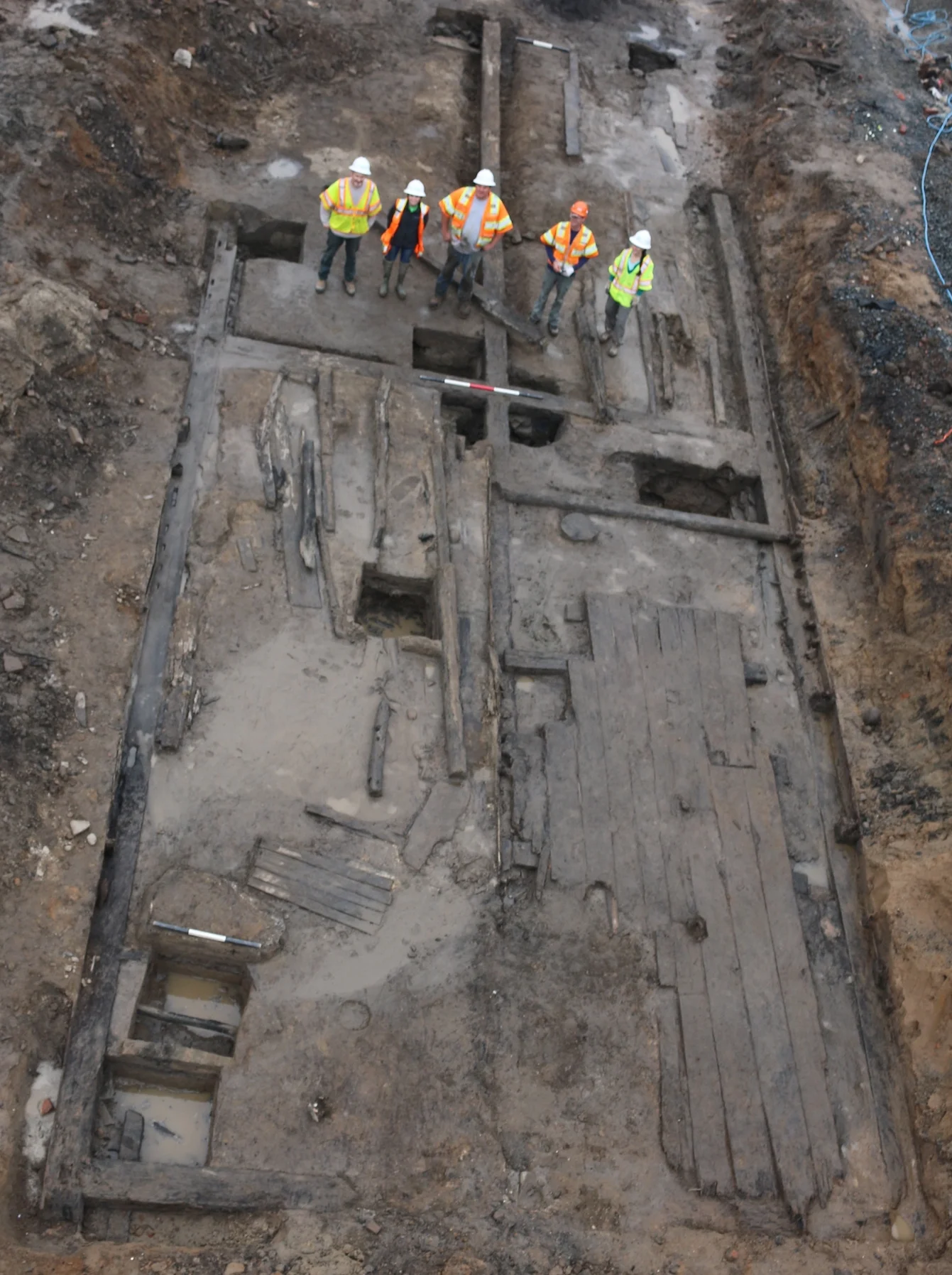 Aerial view of WSSI staff standing on the remnants of the Carlyle warehouse, Alexandria’s first public warehouse.