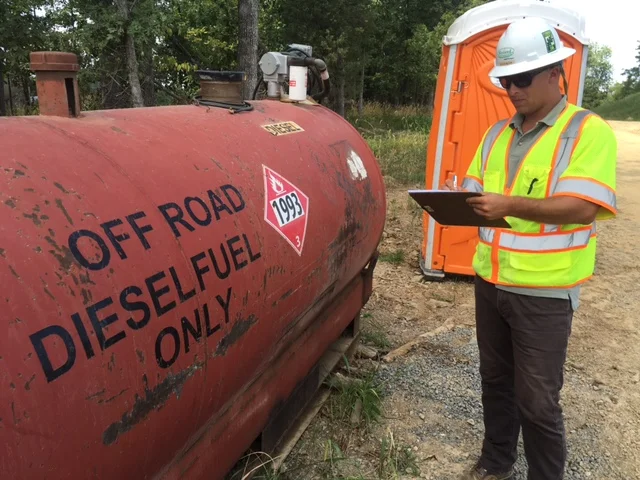 WSSI compliance staff performing a VSMP site inspection, documenting concerns with Pollution Prevention practices at a local site