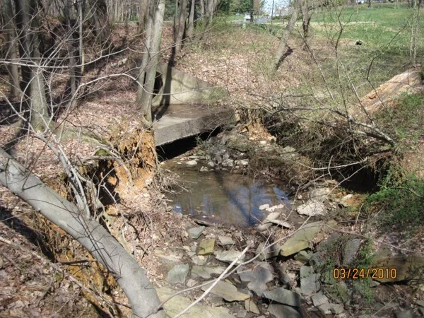 Undermined culvert outlet on NOVA Hebrew Congregation property