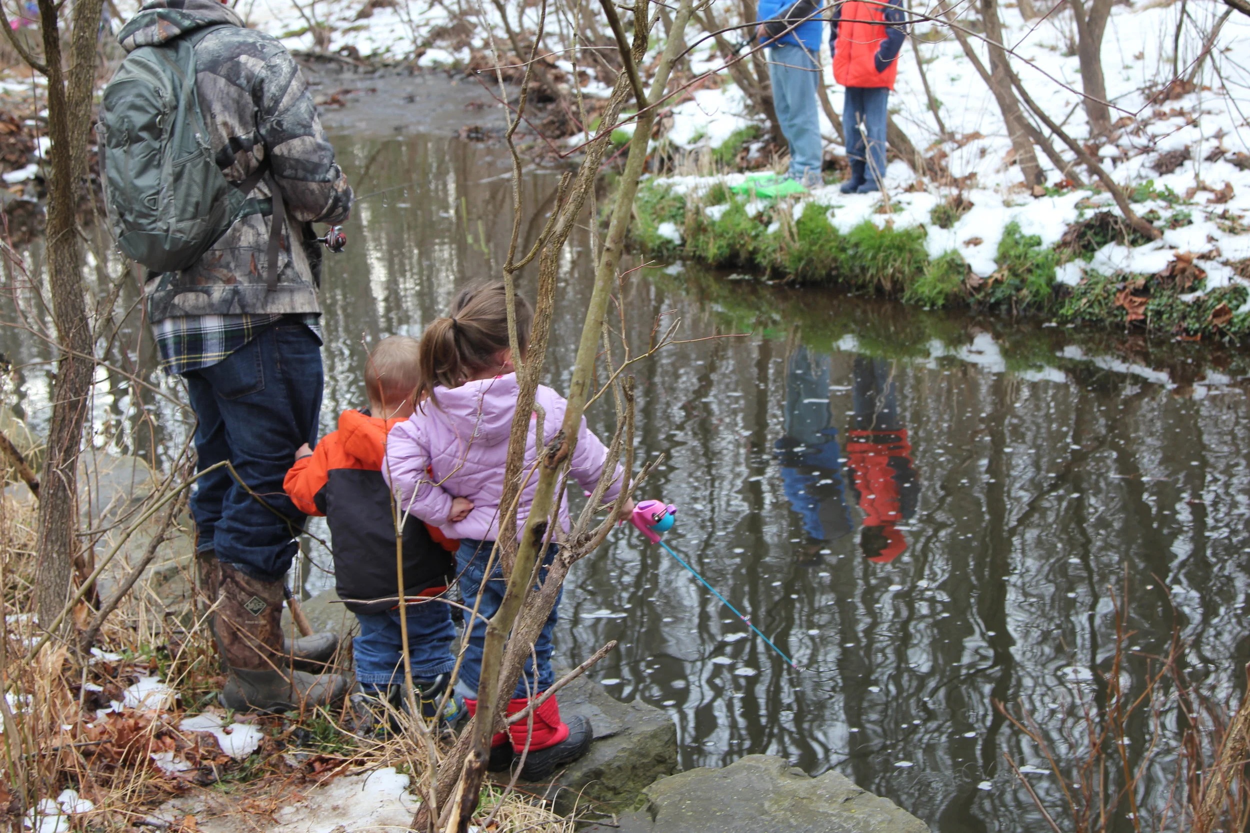 Snowy banks along Snakeden Branch didn’t deter more than 200 kids and their families from an outdoor adventure.