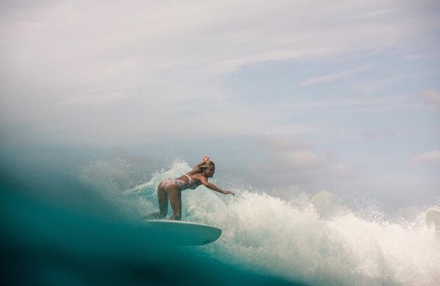 Sophie Hellyer surfing