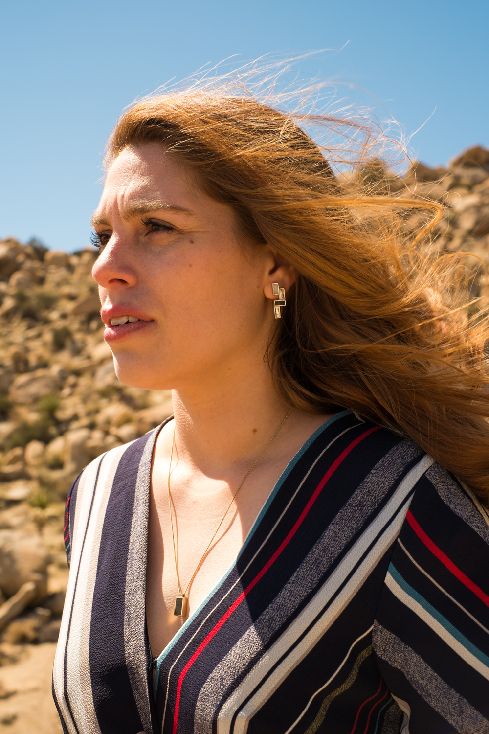 Bianca wears Marmo Earrings and Marmo Pendant .