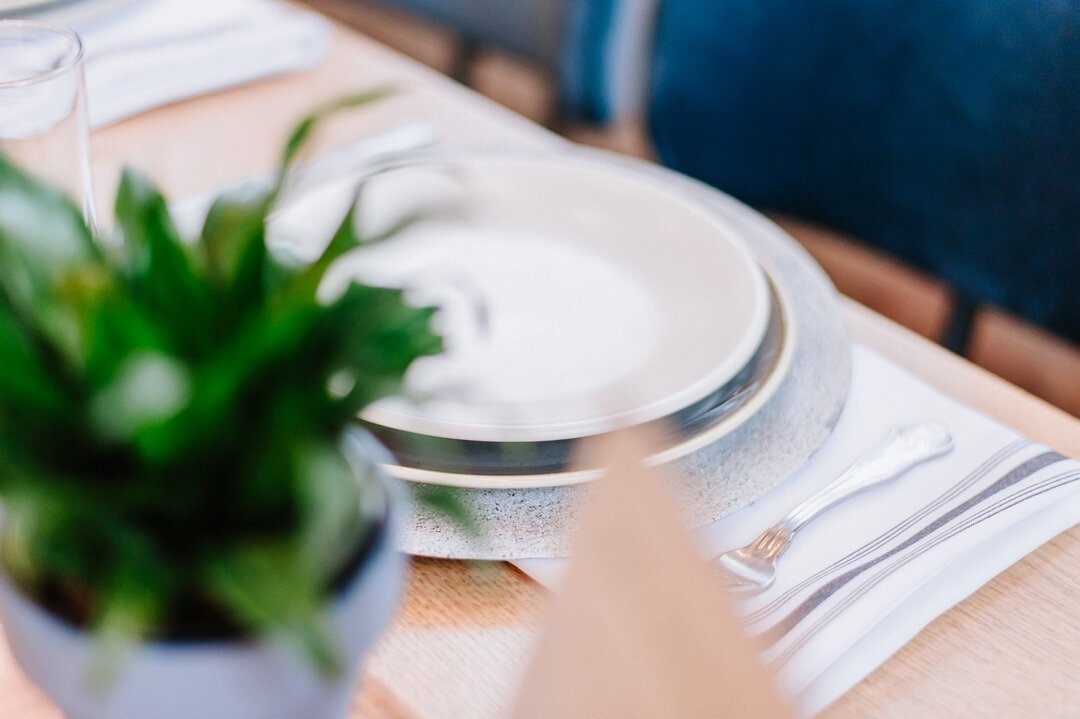 For this intimate dinner we used most of the tableware (plates, glassware, silverware) provided by the restaurant but paired it all with custom made stone chargers to make it all come together.  It wasn&rsquo;t a big investment but it made a really b