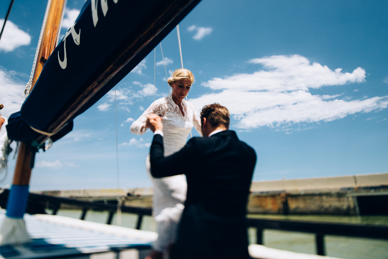 groom-helps-bride.jpg