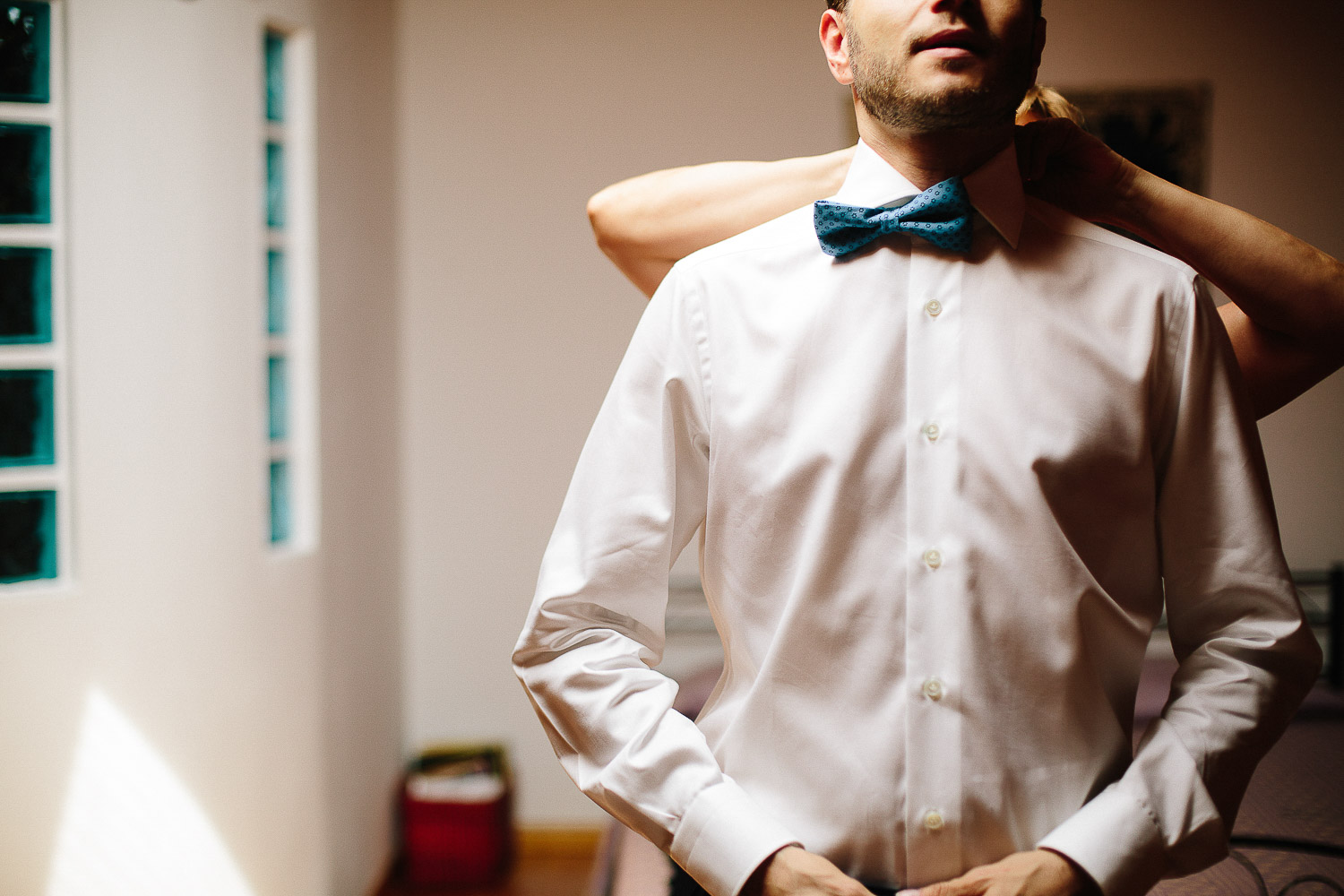 groom-getting-ready-bowtie.jpg