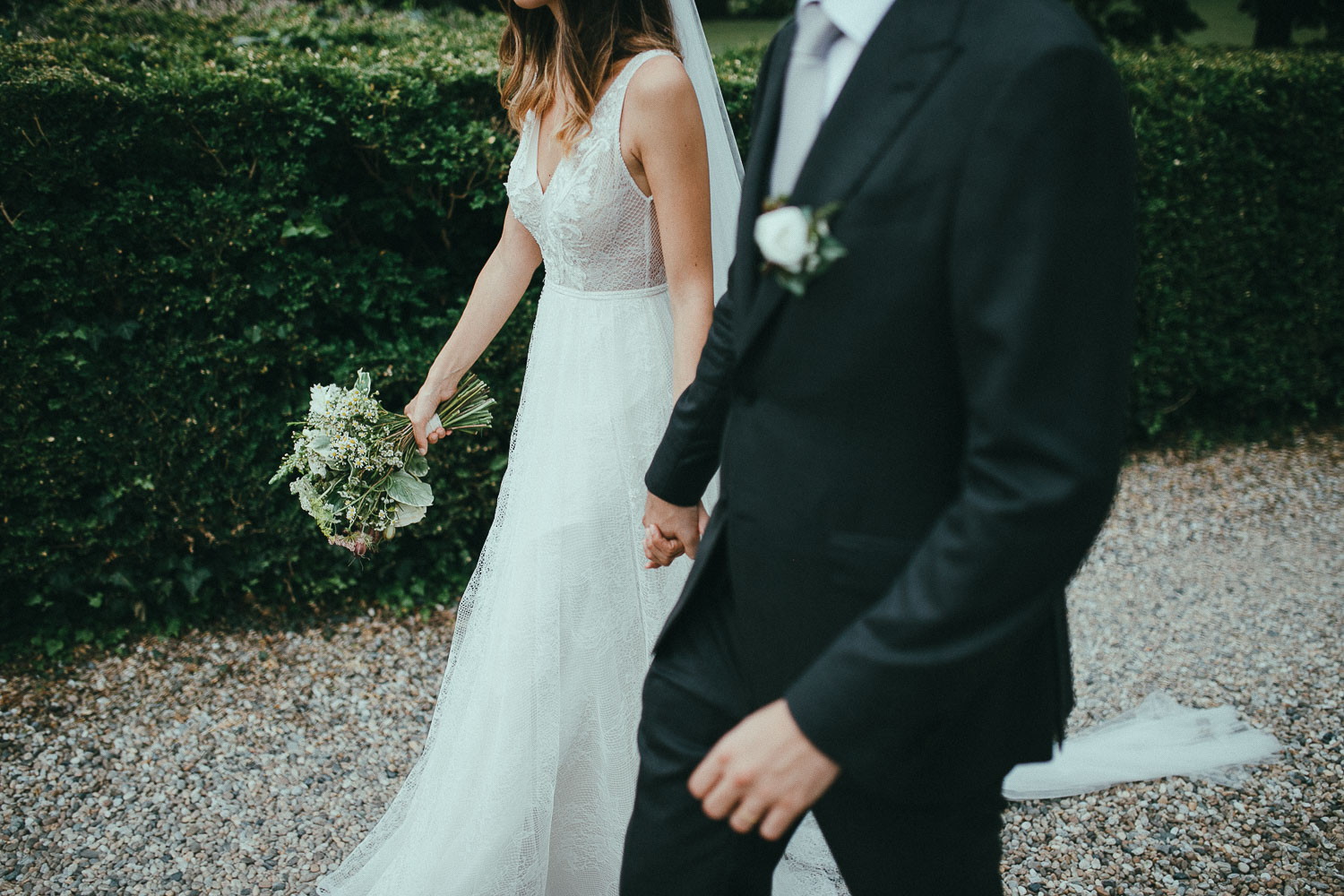 79-bride-and-groom-walking.jpg