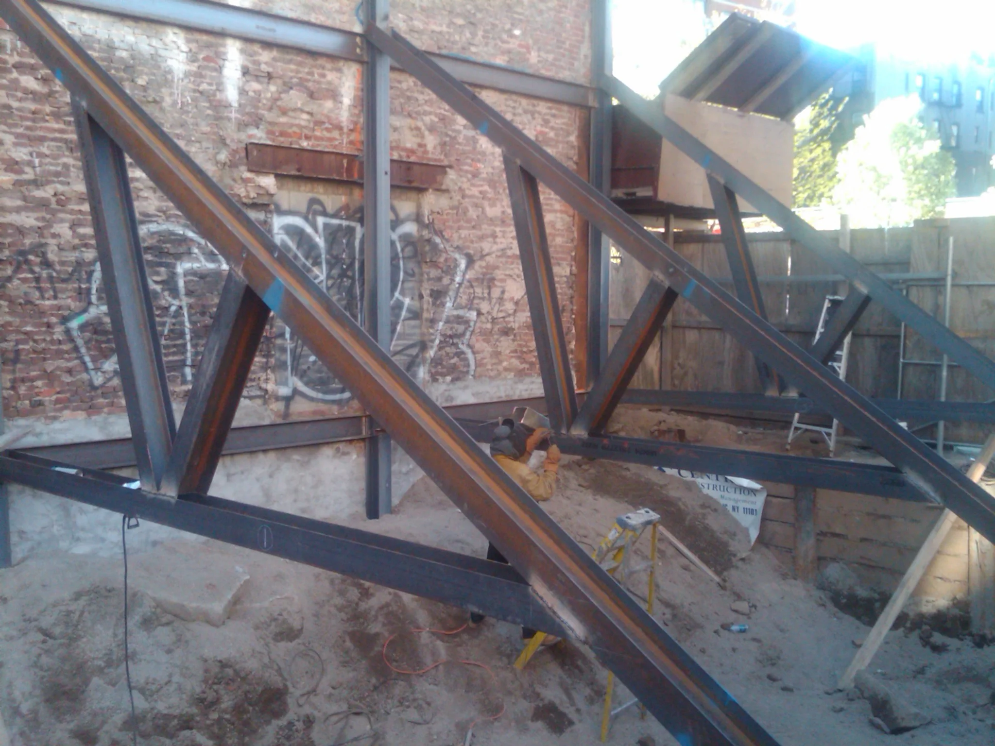 Structural "rakes" temporary emergency supports fabricated and installed onsite