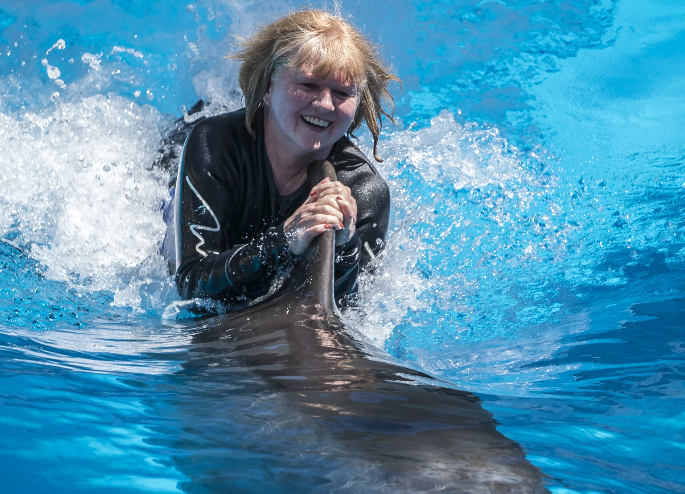 Lady_Riding_Dolphin.jpg