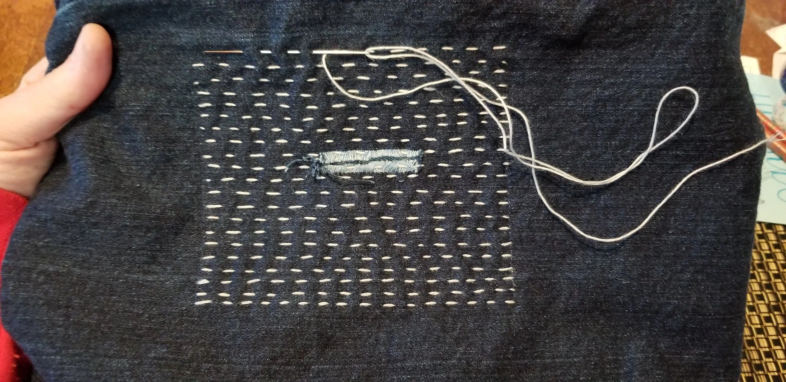 mending, running stitch. white thread on denim. Jodi.jpg