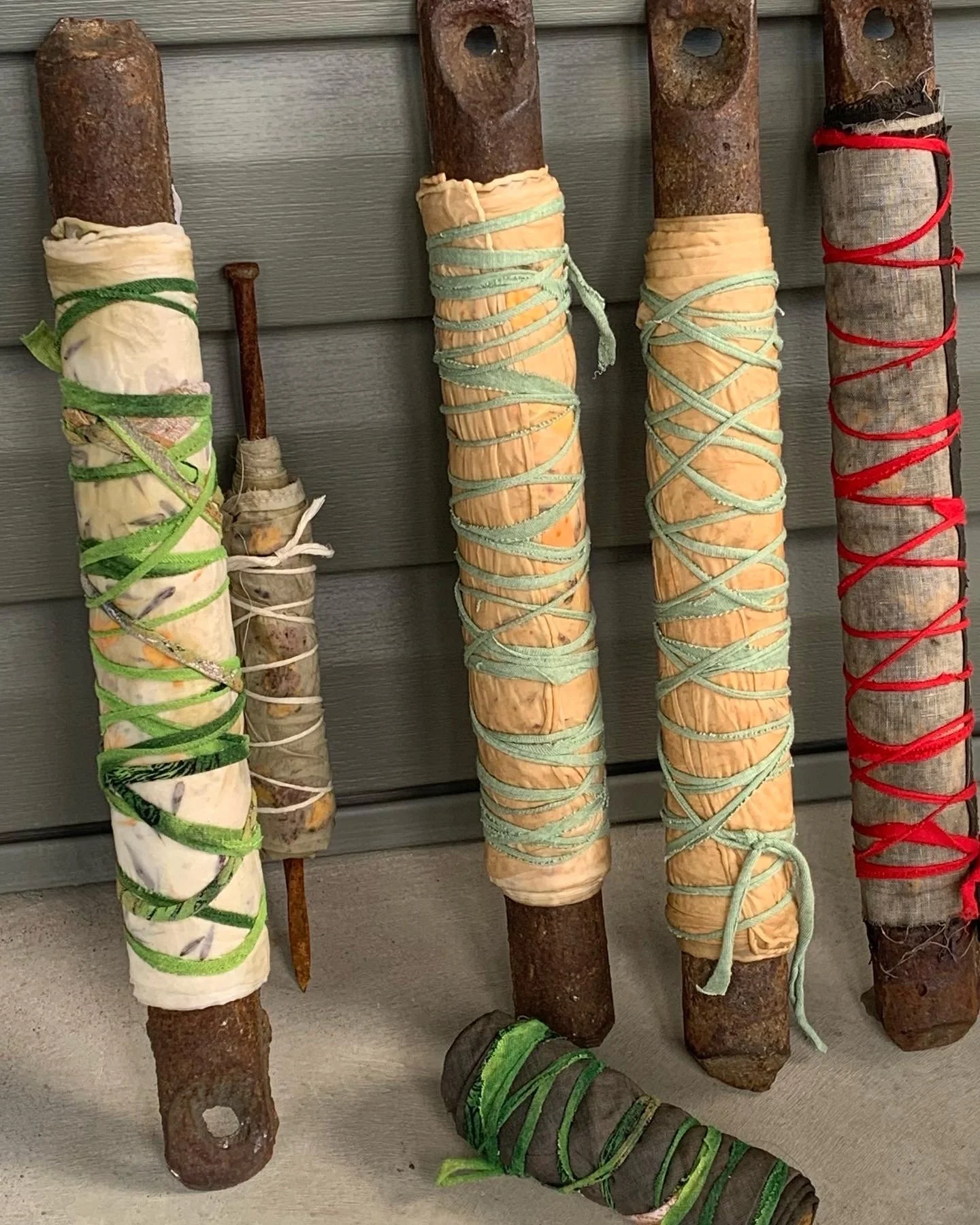 fabric wrapped on window weights for the dirty pot.jpeg