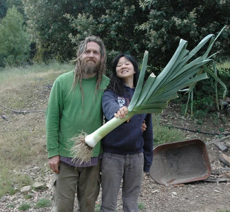 Ok, we're totally using the hold-it-out-in-front-of-you-to-make-your-fish-look-bigger trick, but that's still a pretty big damned leek! And the leeks were planted unusually late that season. Tonia, grower of corn, burner of lime and instigator of chickens, has left Turkeysong to pursue her passion for the sensible union of architecture, communities and building. She will be sorely missed. Wish her luck!