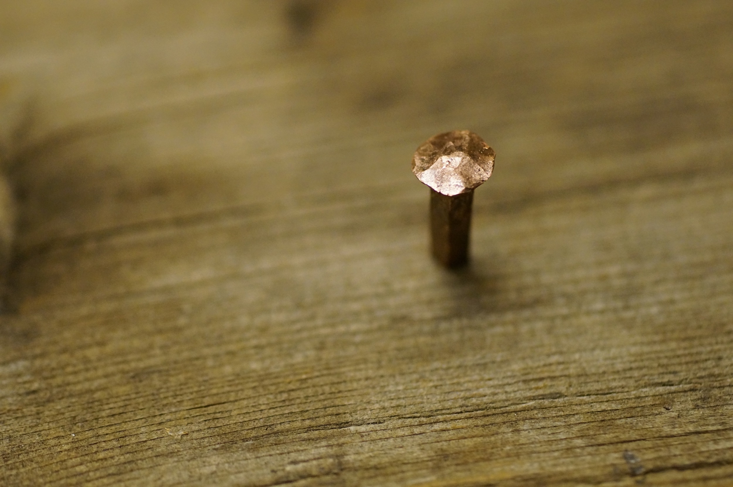 A copper nail made for a project I abandoned. I would have had to make about 90 of them.