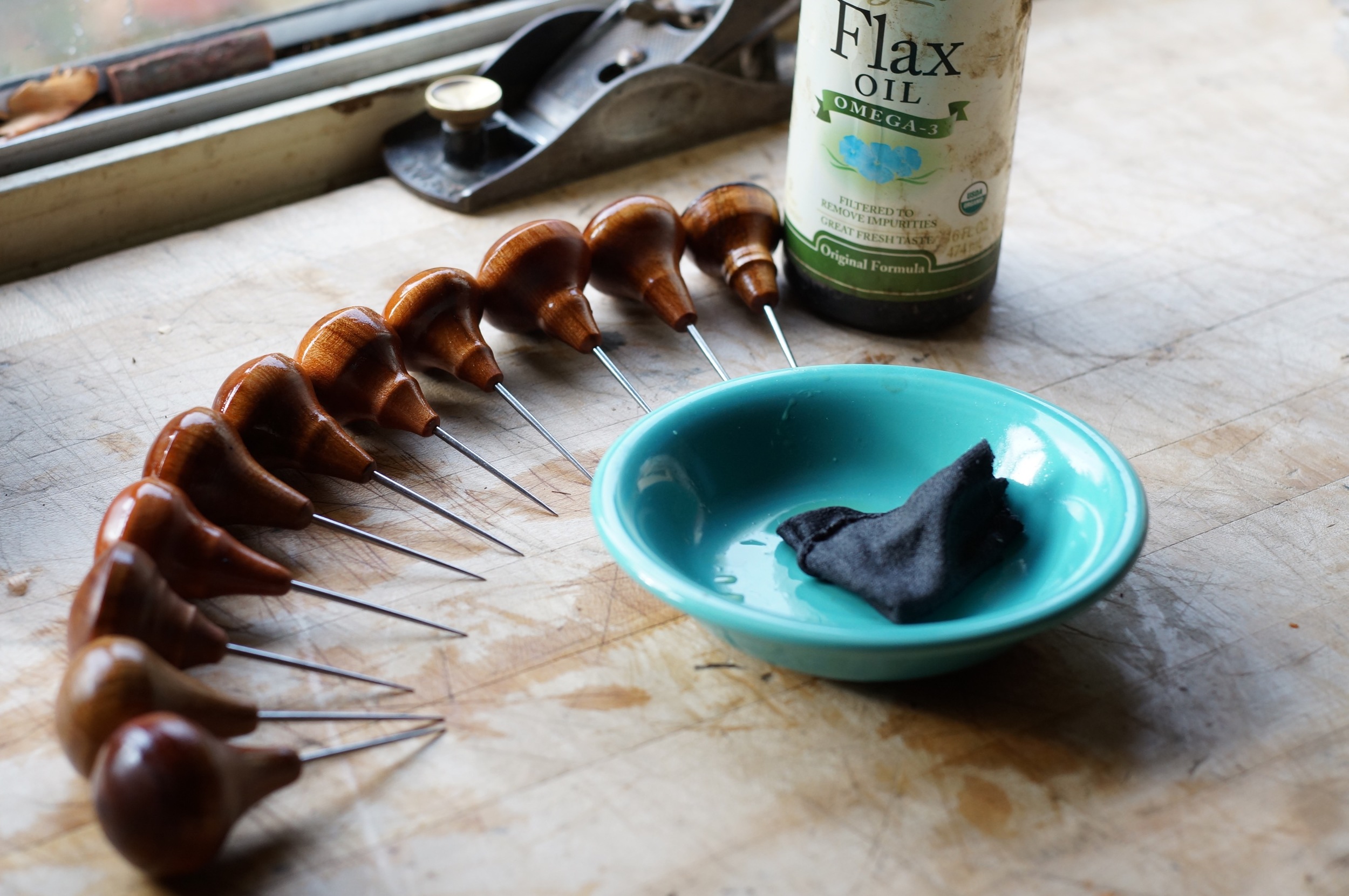 A new batch of leather working awls, getting an oil treatment.