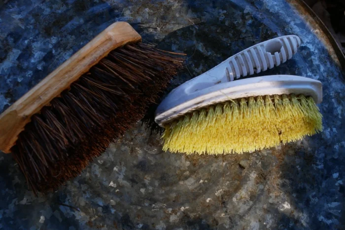 Stiff brushes for cleaning tubs, tools and beams are almost essential