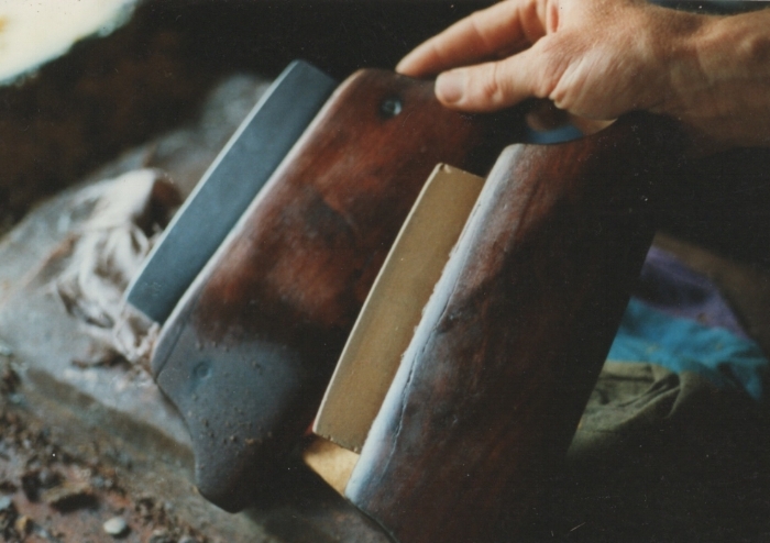 Vintage slickers from the museum area of the Muir McDonald Tannery in Dallas Oregon, now sadly closed. Both are slate. In the tool on the left, it appears that there may be screws for clamping the slate into the handle.