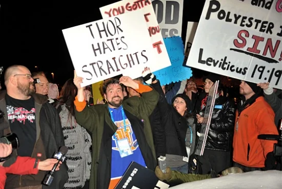 Smith stands with protesters of his Red State at Sundance. Photo: Vulture