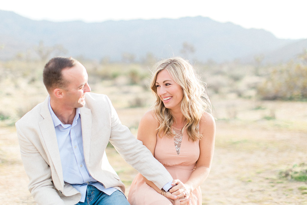 Joshua Tree Engagement Session | What to Wear for Pictures | Southern California Wedding Photographer | Mastin Labs Fuji Film | Fine Art Photographer | Desert Shoot | Couple Laughing.jpg