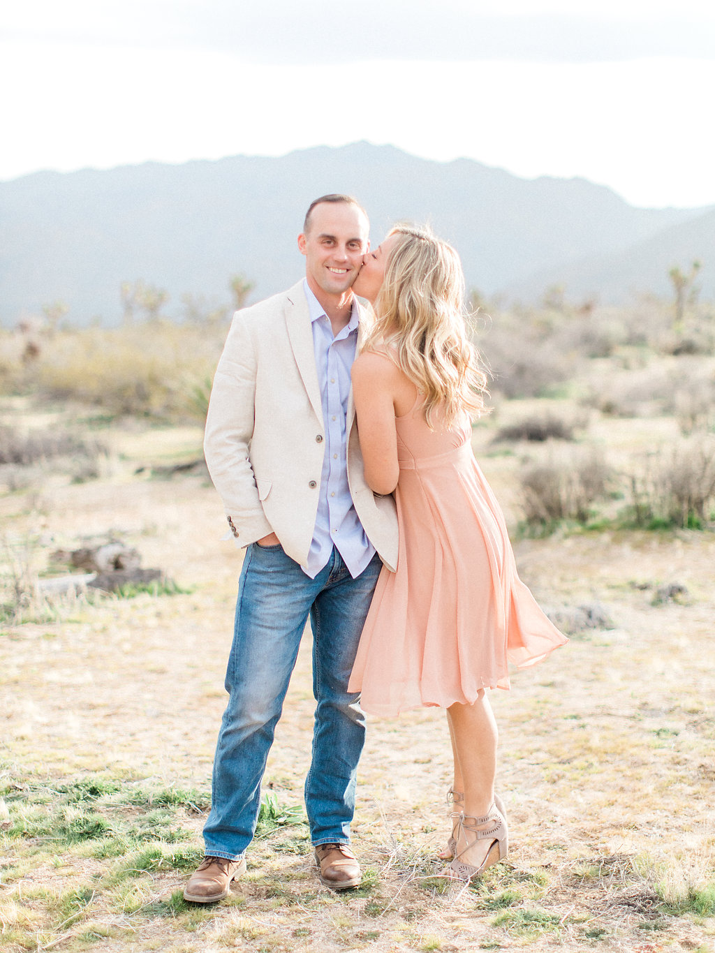 Joshua Tree Engagement Session | What to Wear for Pictures | Southern California Wedding Photographer | Mastin Labs Fuji Film | Fine Art Photographer | Desert Shoot | Kiss on Cheek Shot.jpg