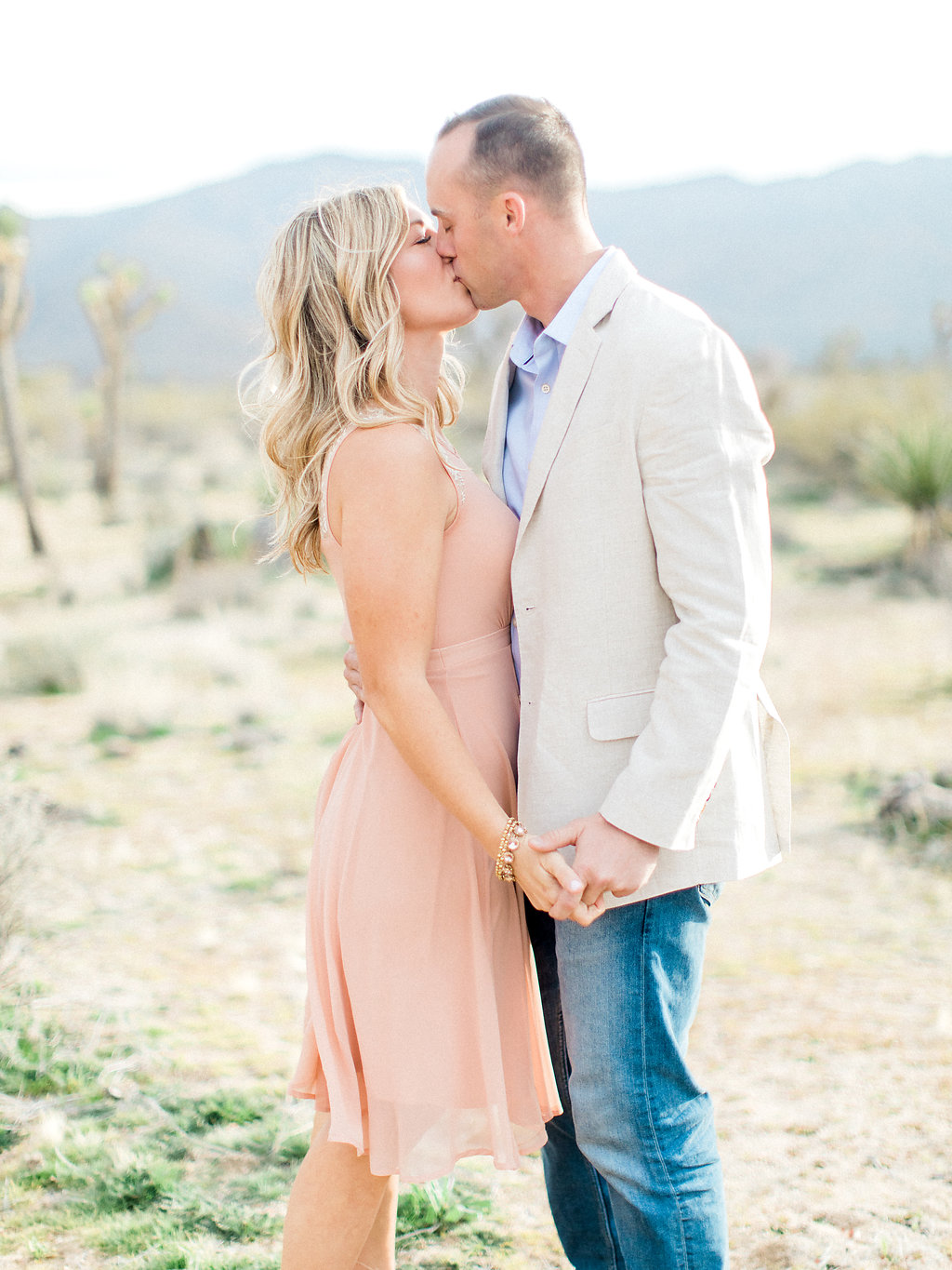 Joshua Tree Engagement Session | What to Wear for Pictures | Southern California Wedding Photographer | Mastin Labs Fuji Film | Fine Art Photographer | Desert Shoot | Kissing Shots in Desert.jpg