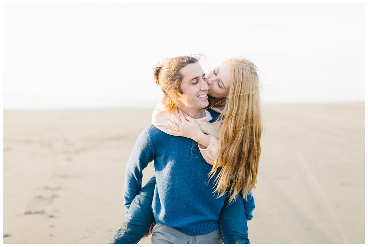 Engagement Sessions and Why They Are Important | Emma Rose Company | Ocean Engagement Session | Fun Posing for Engagement Session.jpg