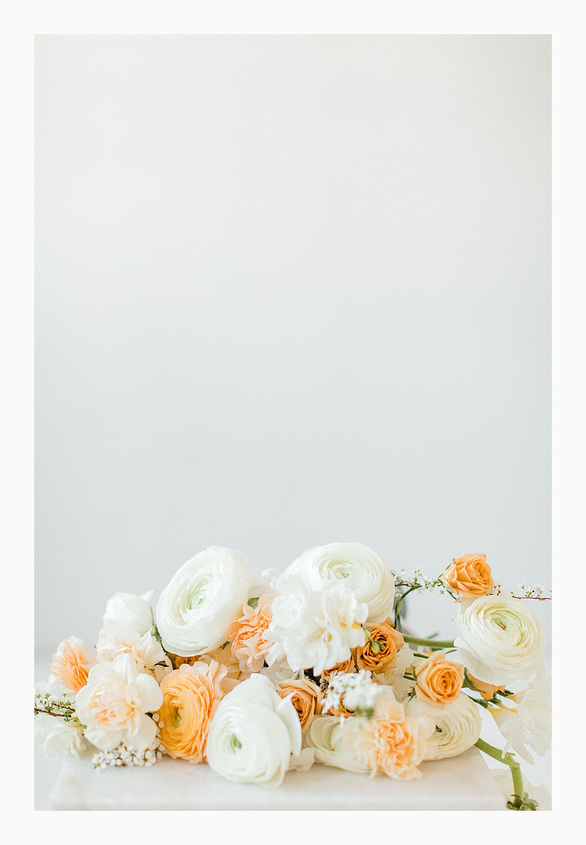 The Bemis Building in downtown Seattle is one of my favorite places to use for photo shoots!  This styled bridal shoot with touches of peach and white was dreamy.  #emmarosecompany #kindredpresets #seattlebride_0005.jpg