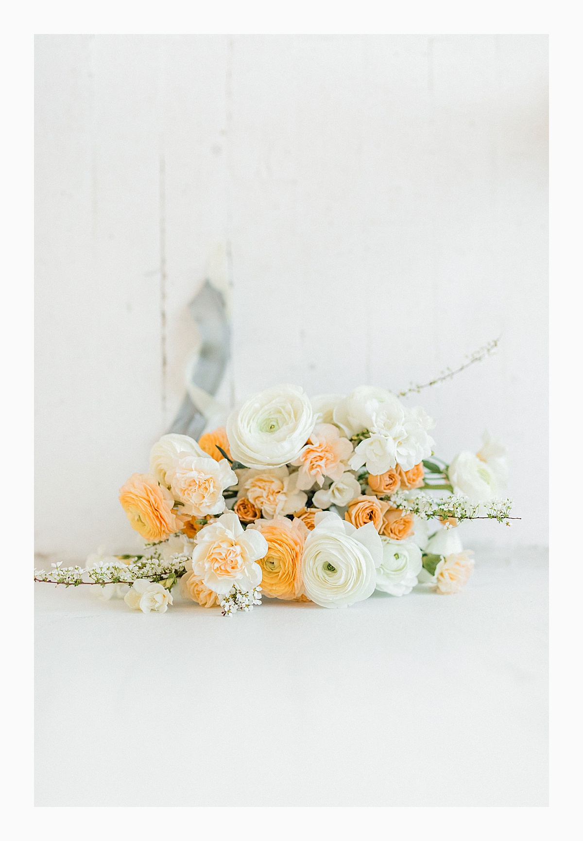 The Bemis Building in downtown Seattle is one of my favorite places to use for photo shoots! This styled bridal shoot with touches of peach and white was dreamy. #emmarosecompany #kindredpresets #seattlebride_0008.jpg