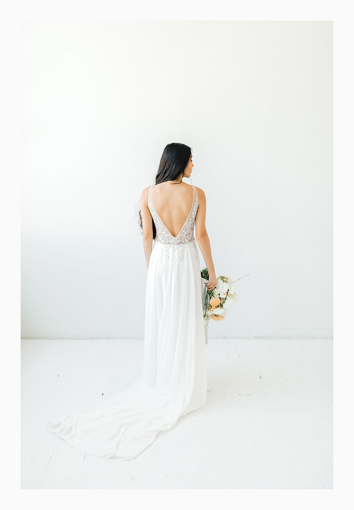 The Bemis Building in downtown Seattle is one of my favorite places to use for photo shoots!  This styled bridal shoot with touches of peach and white was dreamy.  #emmarosecompany #kindredpresets #seattlebride_0016.jpg