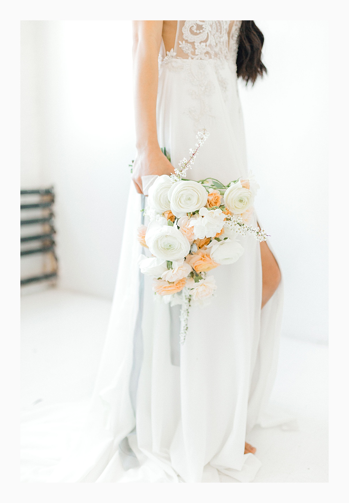 The Bemis Building in downtown Seattle is one of my favorite places to use for photo shoots!  This styled bridal shoot with touches of peach and white was dreamy.  #emmarosecompany #kindredpresets #seattlebride_0018.jpg