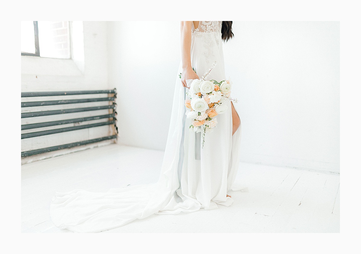 The Bemis Building in downtown Seattle is one of my favorite places to use for photo shoots!  This styled bridal shoot with touches of peach and white was dreamy.  #emmarosecompany #kindredpresets #seattlebride_0019.jpg