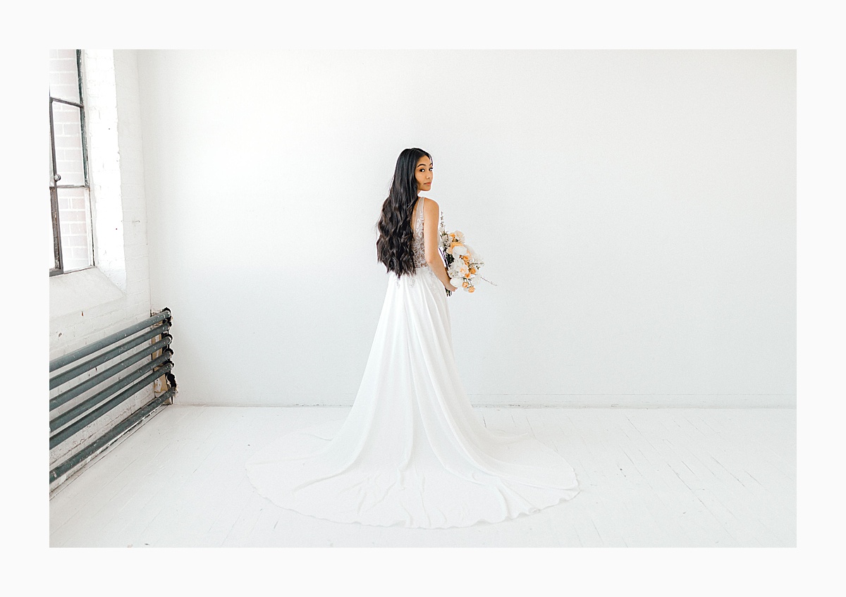 The Bemis Building in downtown Seattle is one of my favorite places to use for photo shoots! This styled bridal shoot with touches of peach and white was dreamy. #emmarosecompany #kindredpresets #seattlebride_0022.jpg