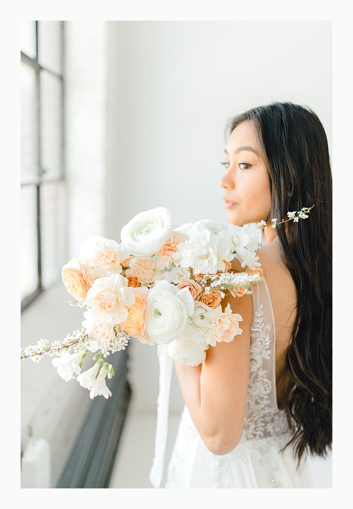 The Bemis Building in downtown Seattle is one of my favorite places to use for photo shoots!  This styled bridal shoot with touches of peach and white was dreamy.  #emmarosecompany #kindredpresets #seattlebride_0026.jpg