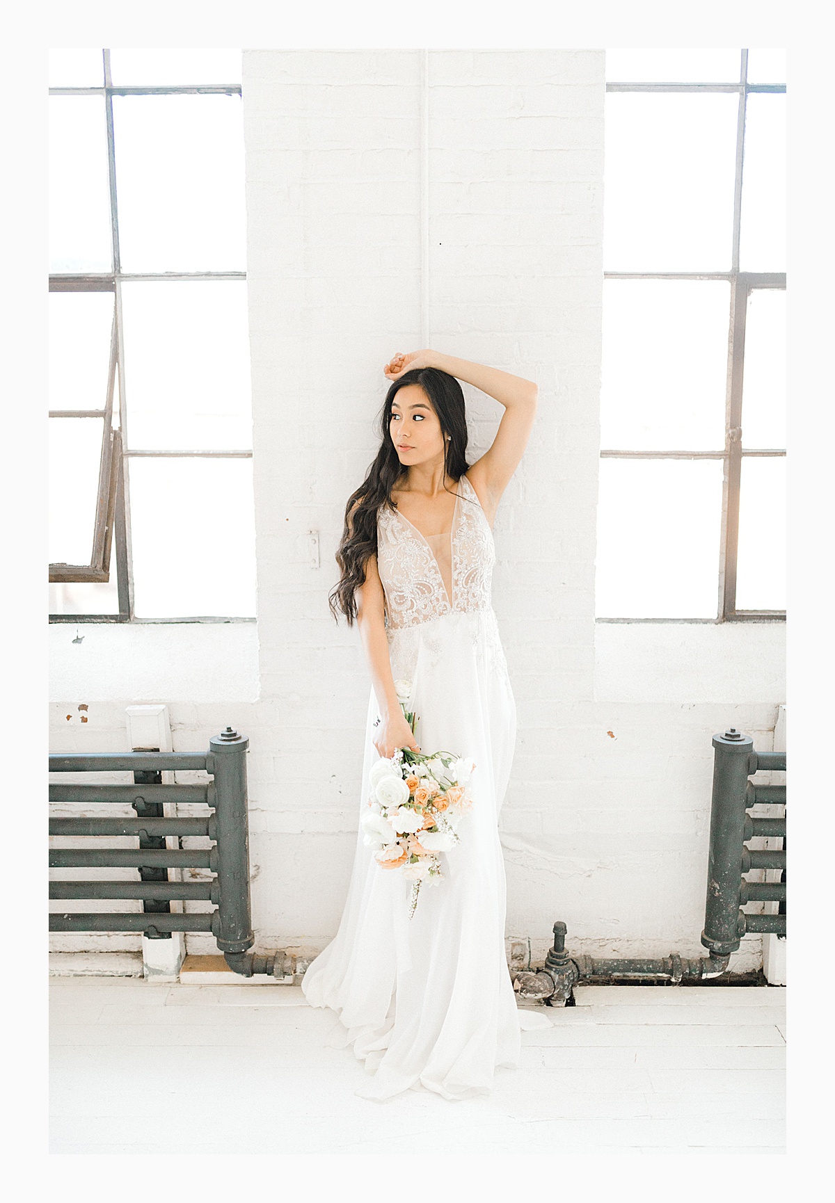 The Bemis Building in downtown Seattle is one of my favorite places to use for photo shoots!  This styled bridal shoot with touches of peach and white was dreamy.  #emmarosecompany #kindredpresets #seattlebride_0027.jpg