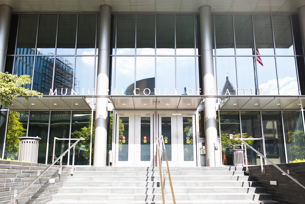 Seattle Courthouse Wedding | Seattle Municipal Court | Downtown Seattle Wedding | Intimate Elopement wedding | Beautiful Purple Bouquet | White Wedding Jumpsuit