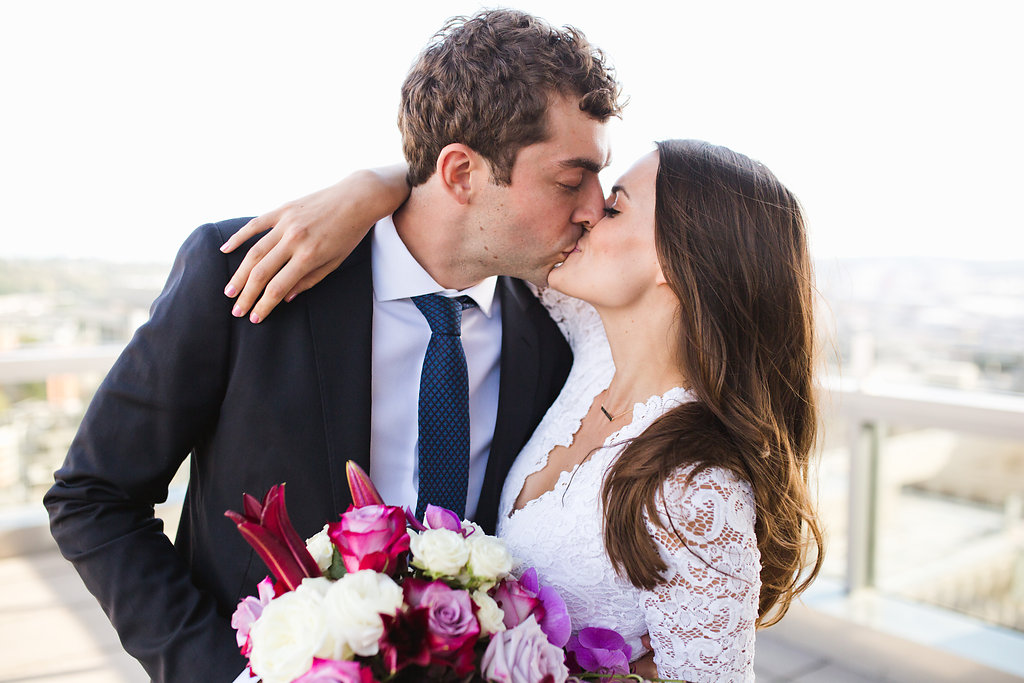 Seattle Courthouse Wedding | Seattle Municipal Court | Downtown Seattle Wedding | Intimate Elopement wedding | Beautiful Purple Bouquet | White Wedding Jumpsuit