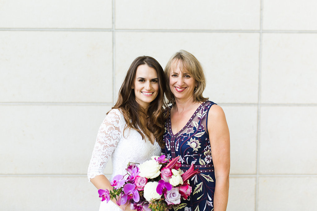 Seattle Courthouse Wedding | Seattle Municipal Court | Downtown Seattle Wedding | Intimate Elopement wedding | Beautiful Purple Bouquet | White Wedding Jumpsuit