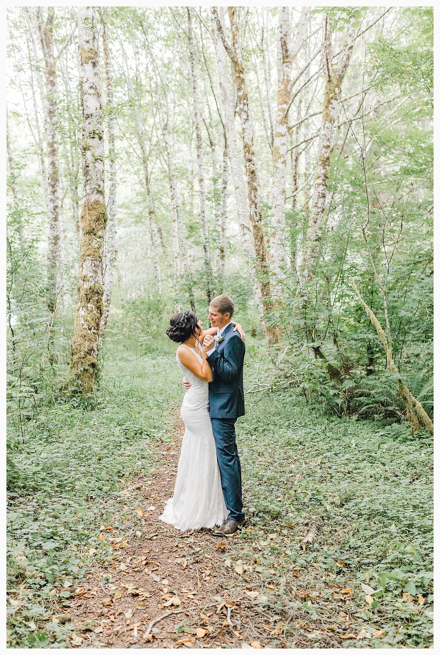 This beautiful lush green Pacific Northwest intimate wedding was a dream, photographed by Emma Rose Company.  From the gorgeous florals by Rhodesia Floral to the succulents and cute wood signs throughout, you will feel inspired._0033.jpg