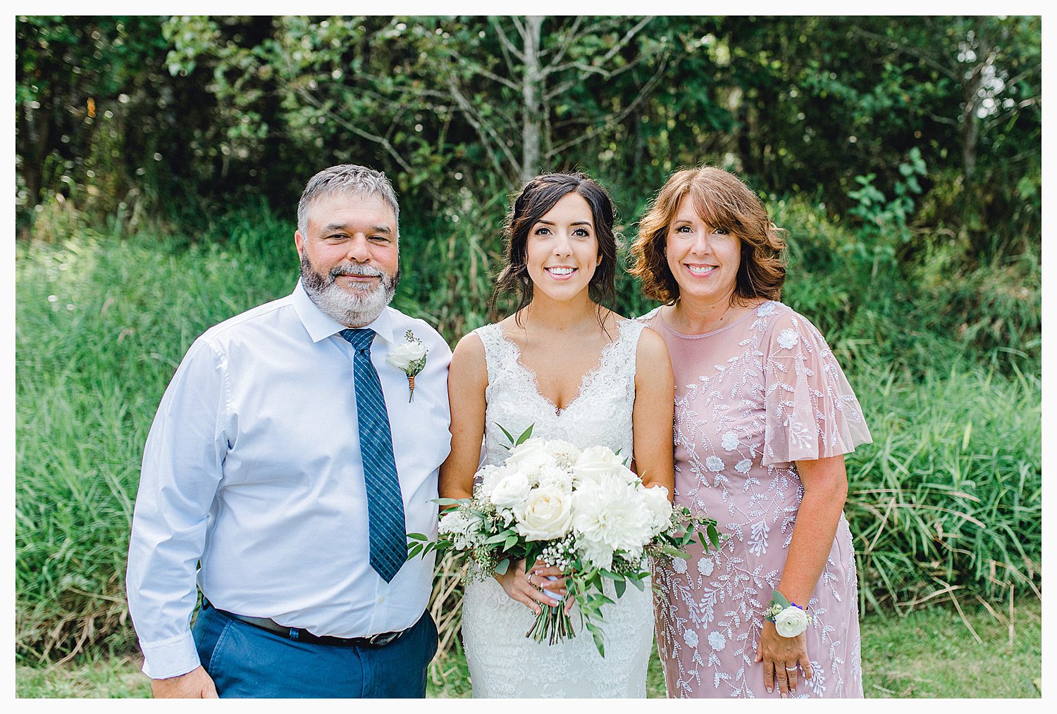 This beautiful lush green Pacific Northwest intimate wedding was a dream, photographed by Emma Rose Company.  From the gorgeous florals by Rhodesia Floral to the succulents and cute wood signs throughout, you will feel inspired._0046.jpg