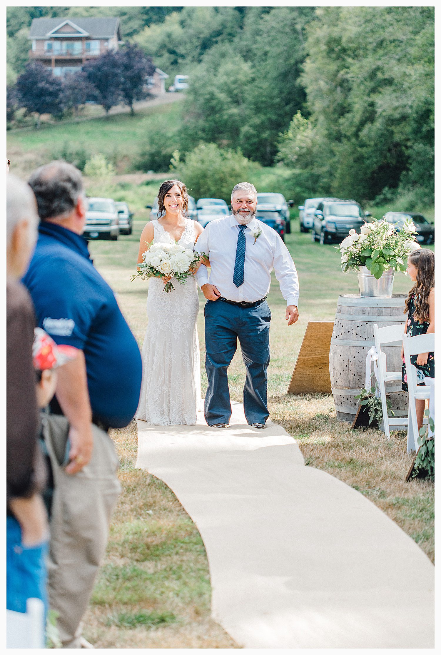 This beautiful lush green Pacific Northwest intimate wedding was a dream, photographed by Emma Rose Company.  From the gorgeous florals by Rhodesia Floral to the succulents and cute wood signs throughout, you will feel inspired._0052.jpg