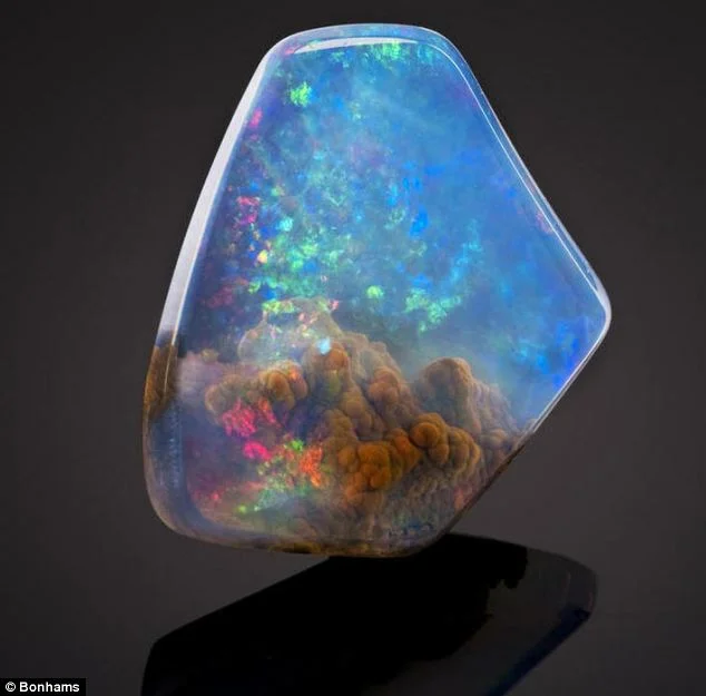 Opal Butte, 740 carats. Found in Oregon, this opal looks like it contains an underwater universe. It is currently in a private collection, but they'll entertain offers!