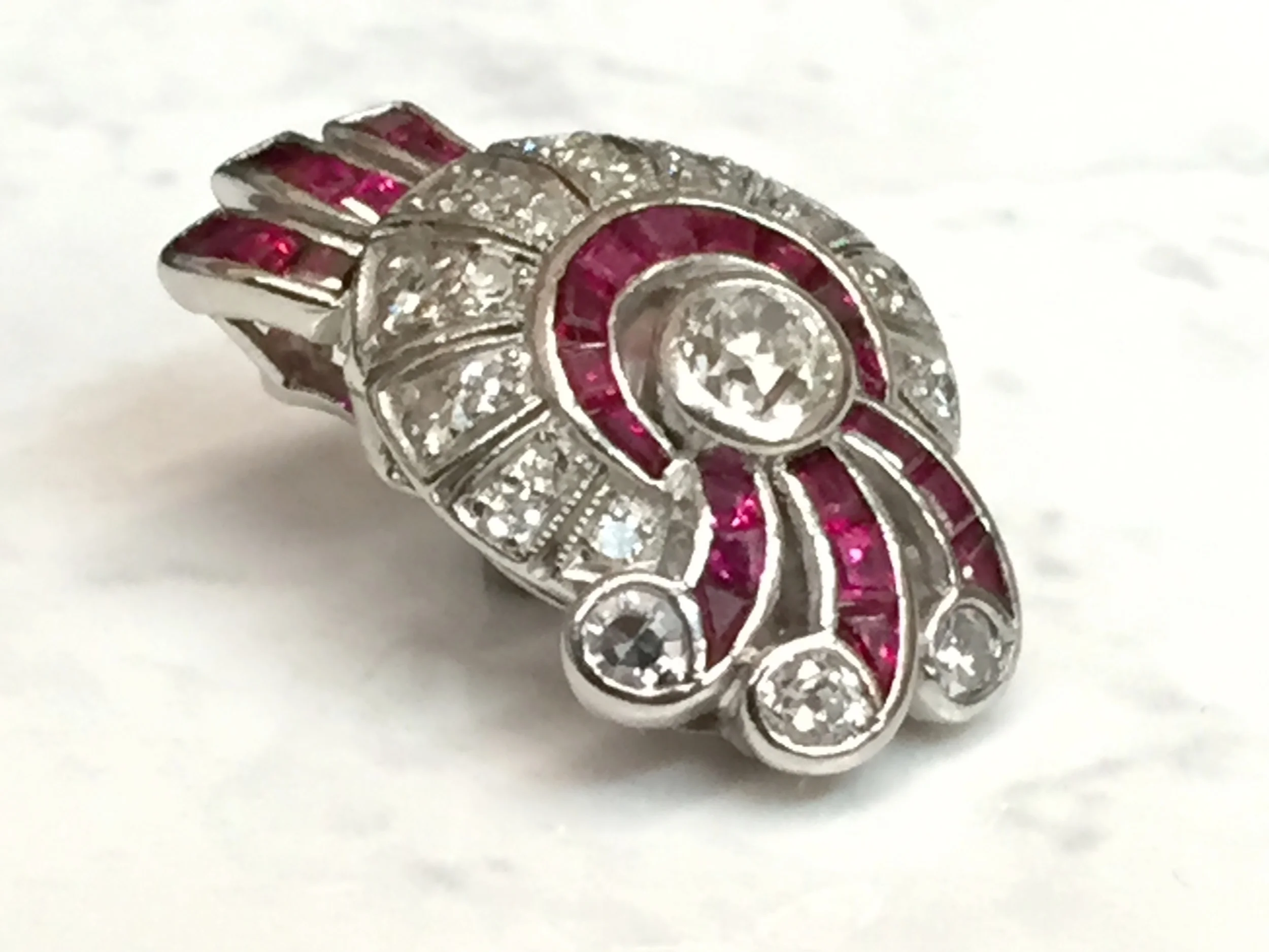 With Pigeon Blood Rubies, Diamonds and Platinum, this unique pendant will turn heads wherever you go