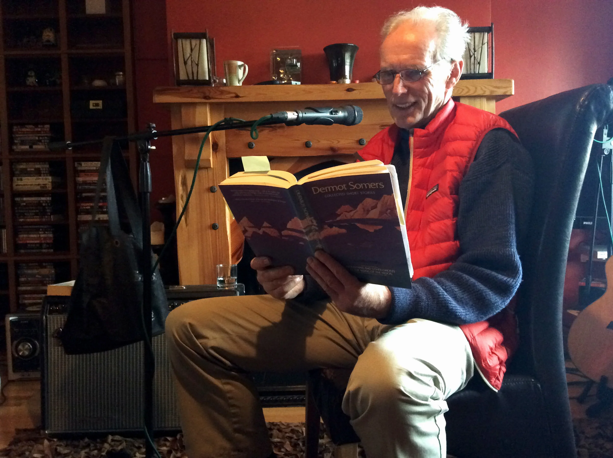 Dermot reading a book. His own bloody book, of course.