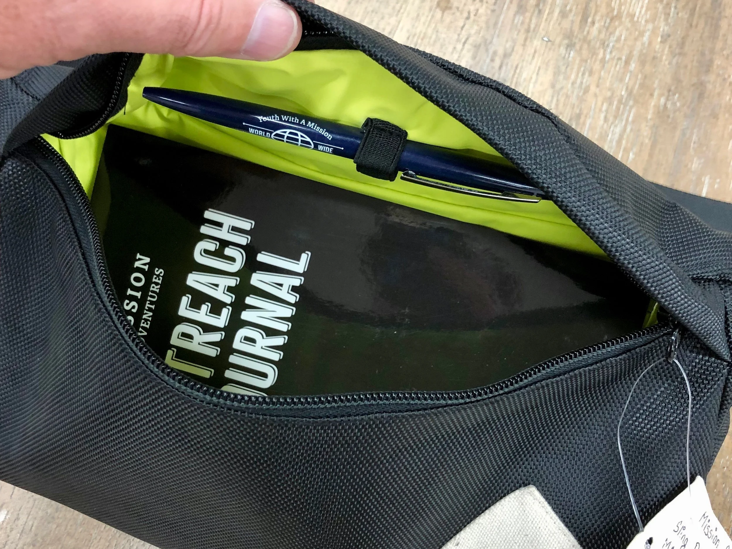 Interior of “sling bag”. Note the bright lining to make it easy to see inside. Note also an MA Journal and an MA pen both fit nicely inside with plenty of extra space