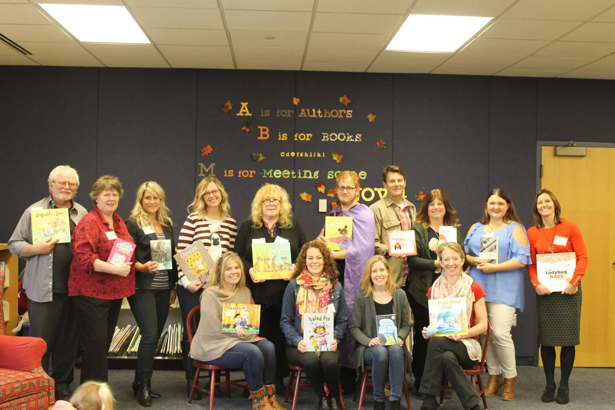 Back row: Charlie Barshaw, Ruth McNally Barshaw, Heather Smith Meloche, Kelly DiPucchio, Denise Fleming, Jordan Scavone, Timothy Dziobak, Kathy Higgs-Coulthard, Sierra Masson, Amy Nielander Front row: Dena Albergo Jayson, Wendy BooydeGraaff, Kristin Bartley Lenz, Debbie Diesen (photo credit: Maggie and Paula Sanders Sandefur )