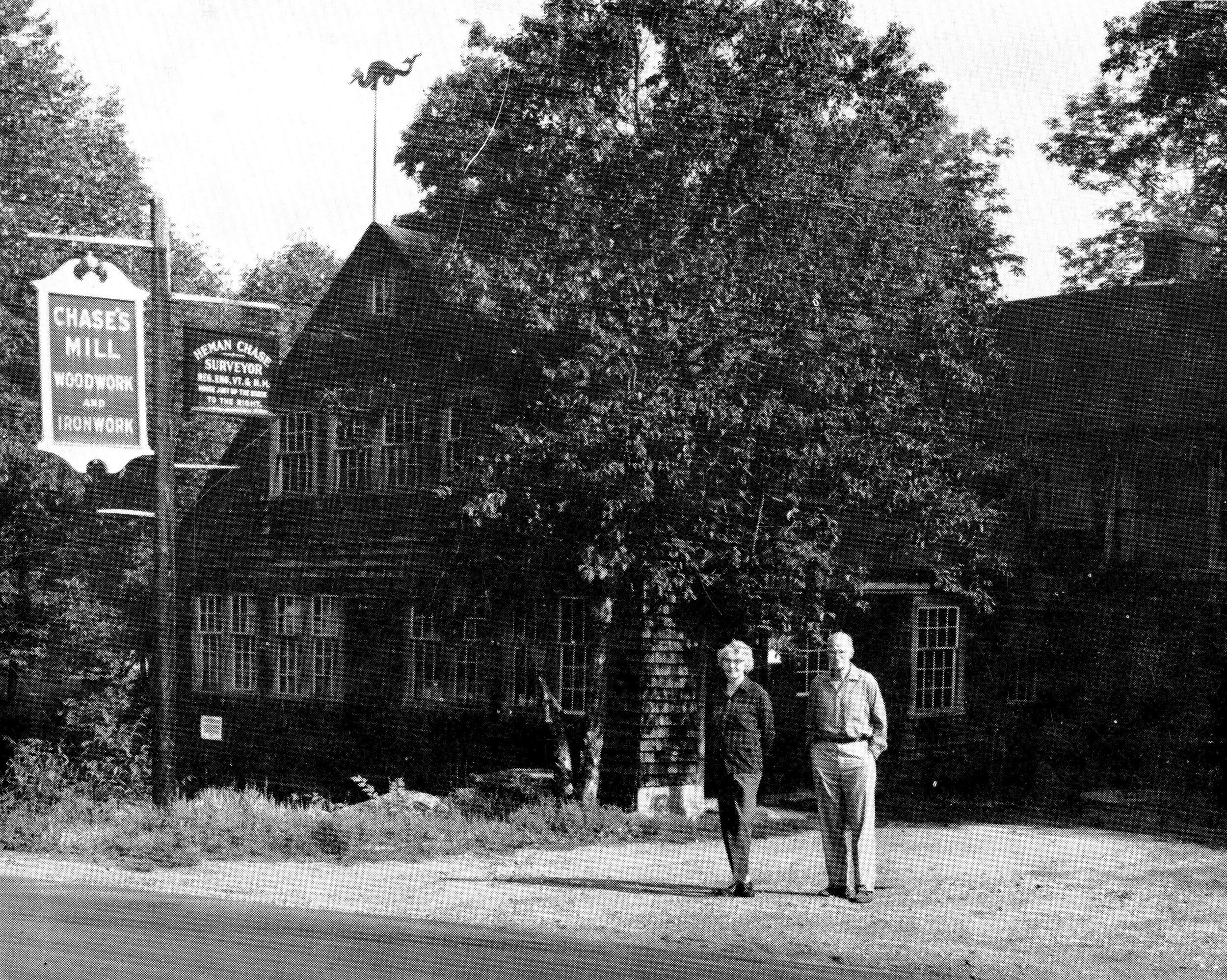 Heman and Edith Chase in front of the mill