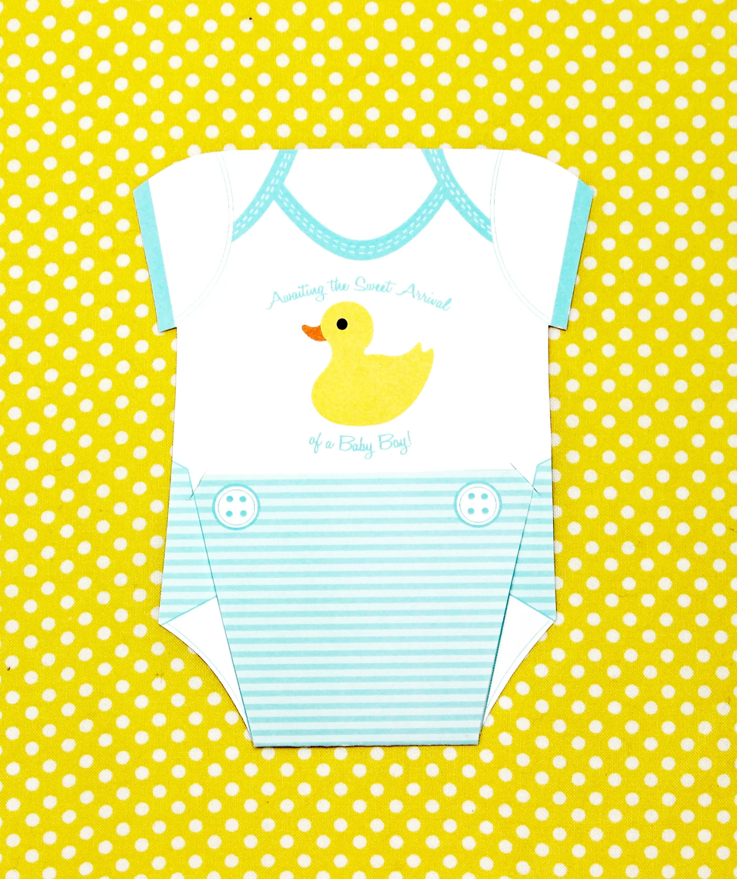 Baby shower invitation; diaper folds open with invitation details
