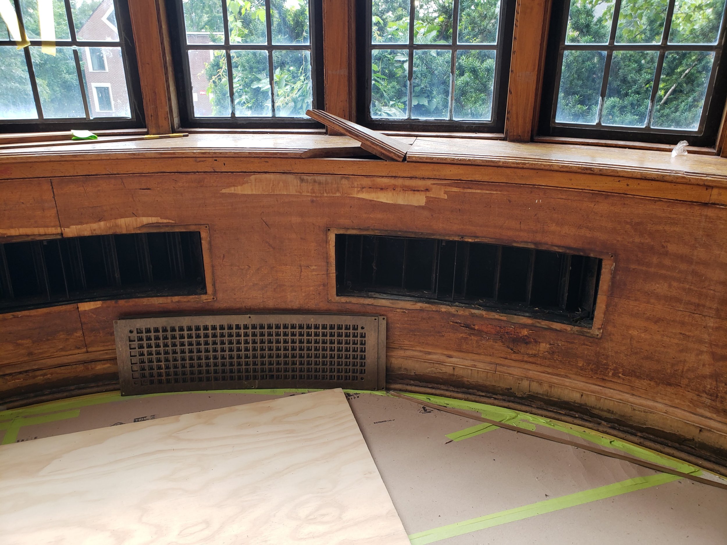 Before: Curved Veneer Wall Repair